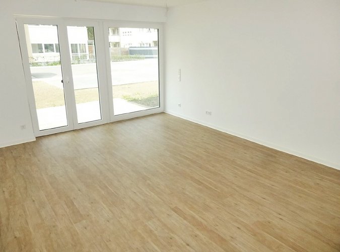 Wohnzimmer mit Zugang zur Terrasse