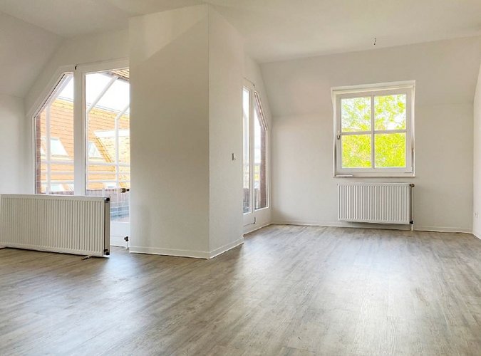 Wohnzimmer mit Loggiablick